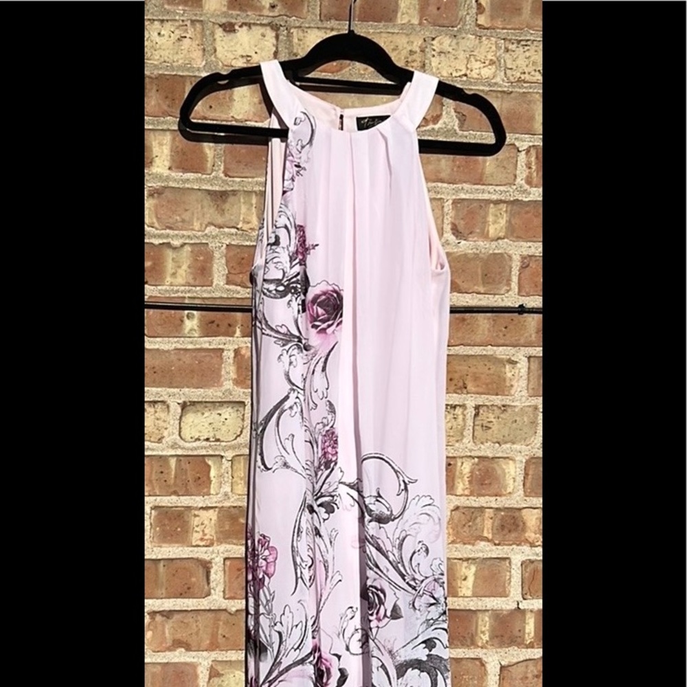 Thalia Sodi sleeveless summer dress. Light pink with black design with roses